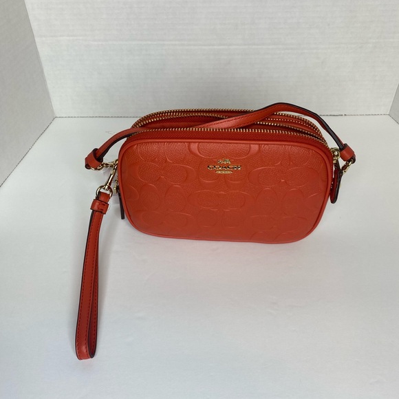 Coach camera bag with signature coated canvas detail. Shoulder/wrist strap.Coral - Picture 8 of 8